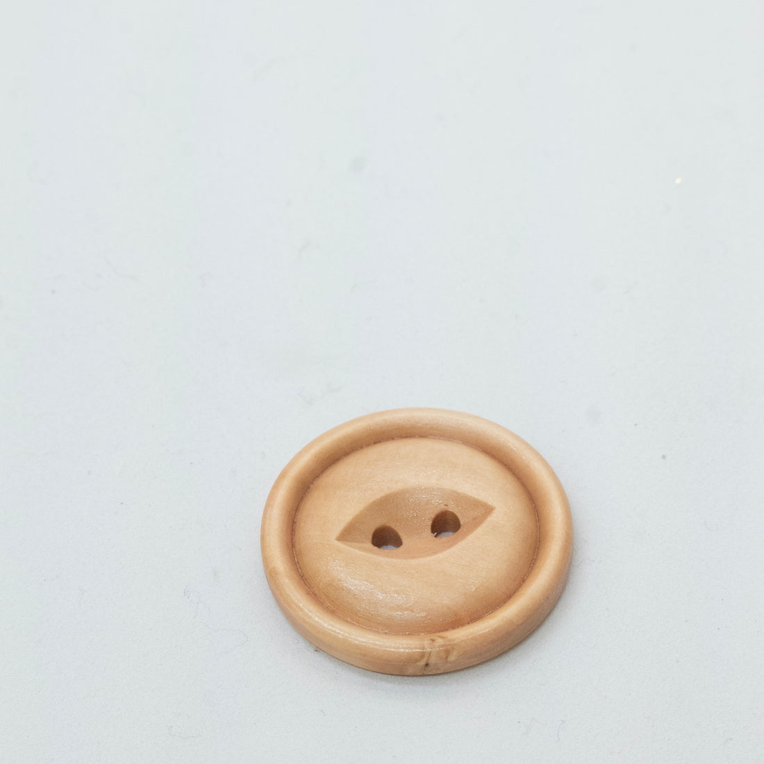 Botón de madera #54